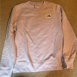The North Face women’s Light Purple Crewneck Sweatshirt.